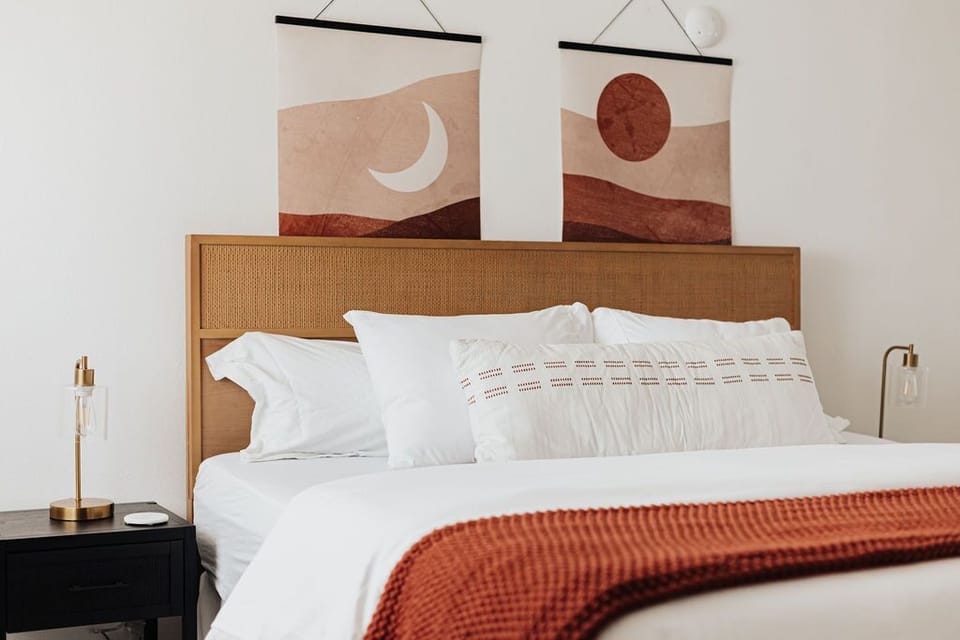 well-appointed room with a plush queen-size bed.
