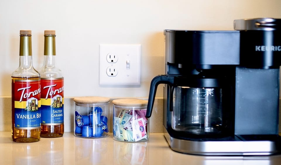 Brew a pot or a cup of coffee with all the fixings: sweeteners & creamer!