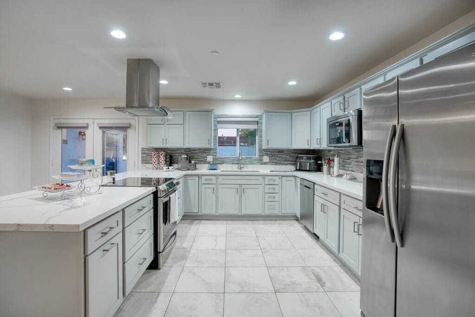 Newly updated fully equipped kitchen with all electric stainless steel Electrolux appliances