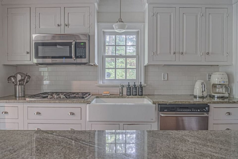 Kitchen includes new stainless steel appliances