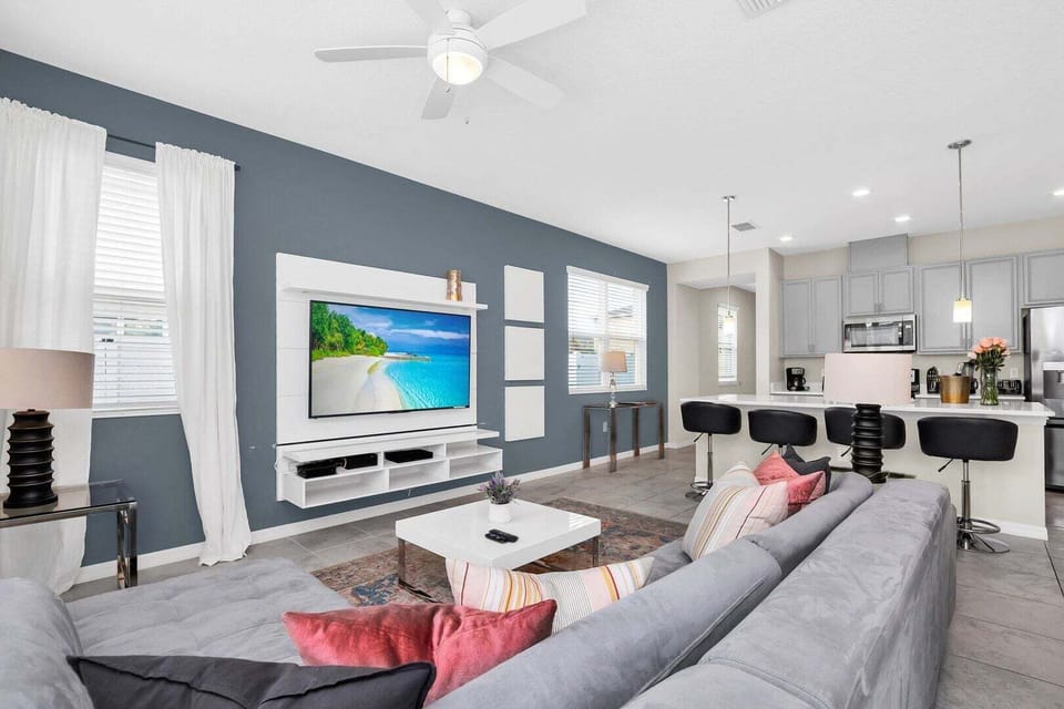 Enjoy cozy movie nights in ample plush seating.
