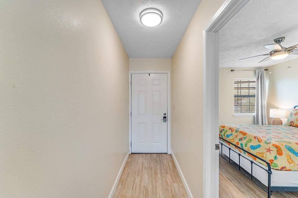 Entrance to the Home with the Downstairs Bedroom to the Left as You Walk In