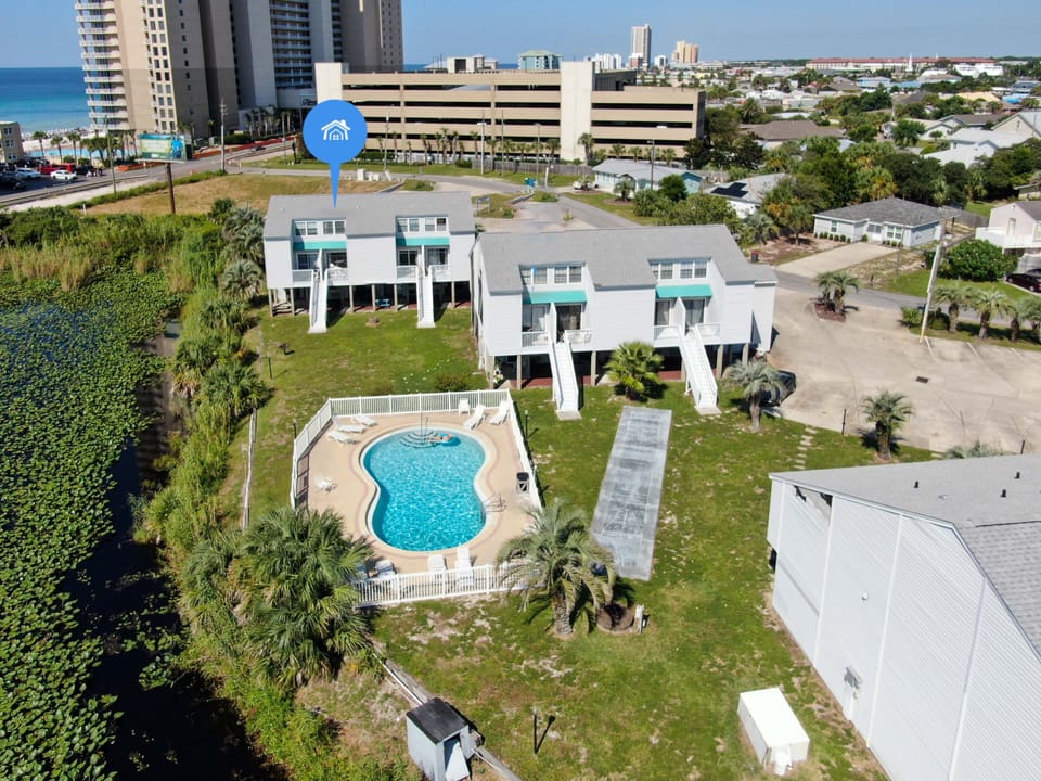 Aerial View of Lullwater Beach Condo's Community Swimming Pool