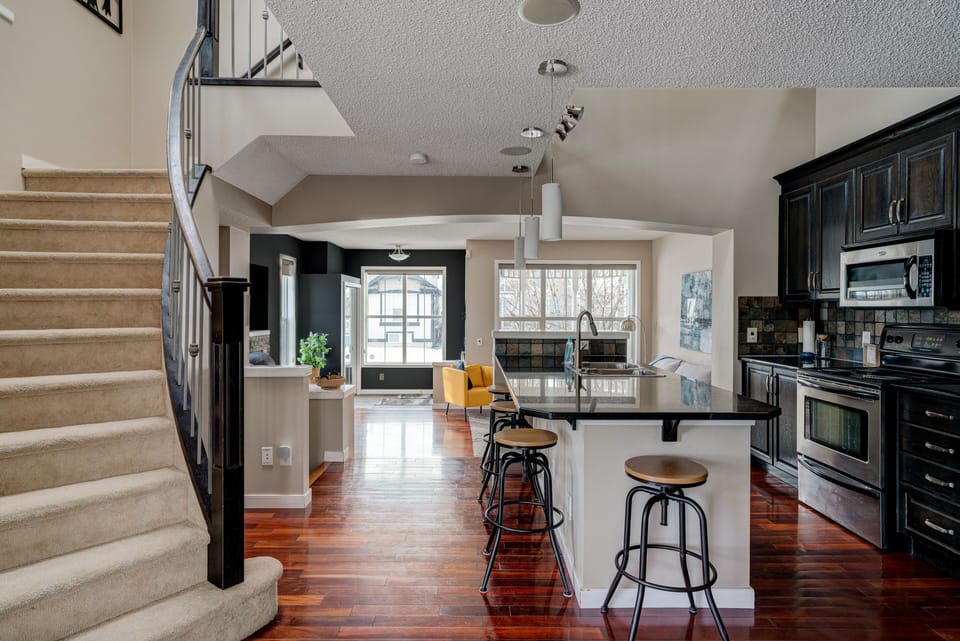 Nice granite island and all the appliances you need to make a delicious meal. 