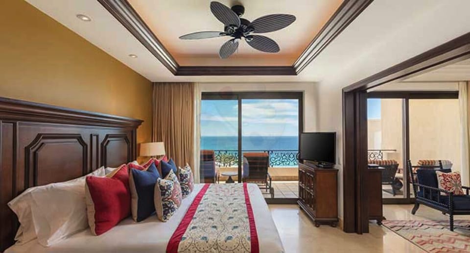 Grand Master Suite Bedroom (doors open to living room)