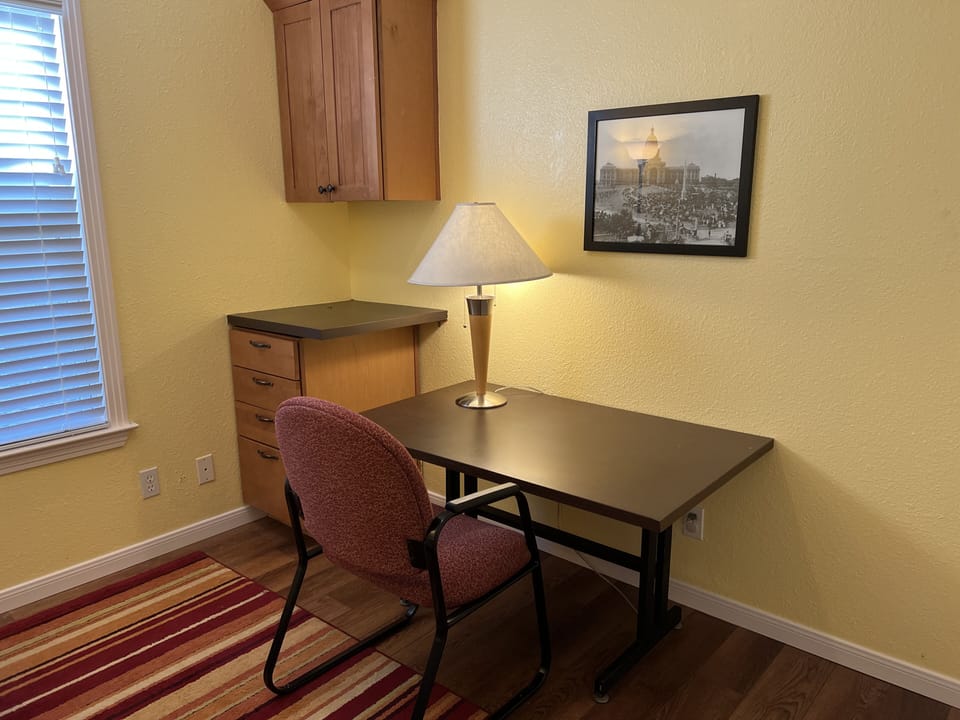 Private office (3rd bdrm) includes desk, lamp & Google fiber internet.