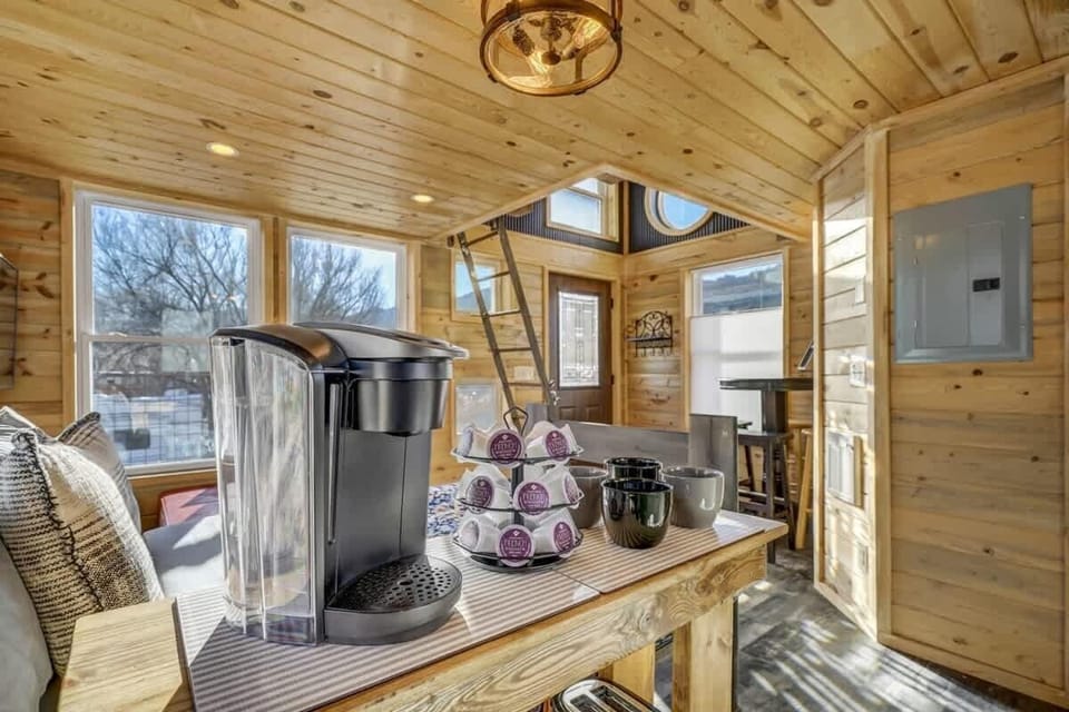 Having coffee while lounging at the treehouse is definitely a great idea.