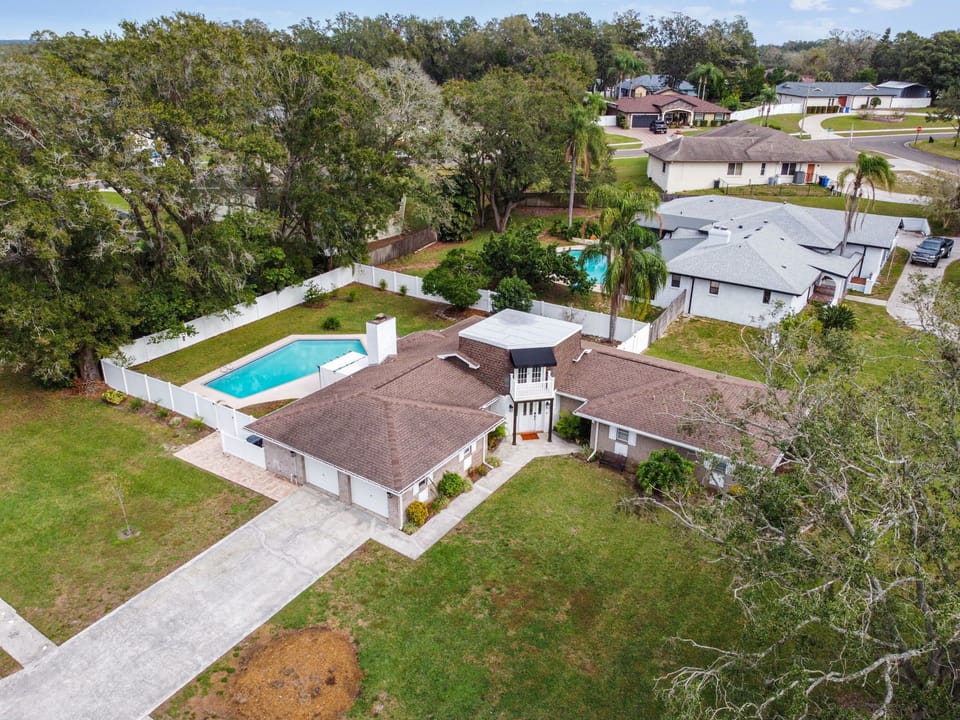 Sandhill House has ample parking and a large enclosed yard for your family.