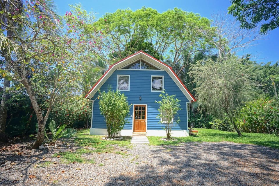Step into your charming Manzanillo Cottage in the heart of town, just a short walk to the beach