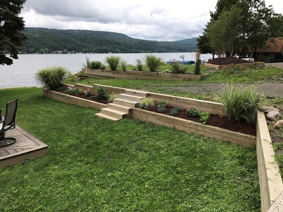 Early spring gardens. Summer garden is full of blooming flowers