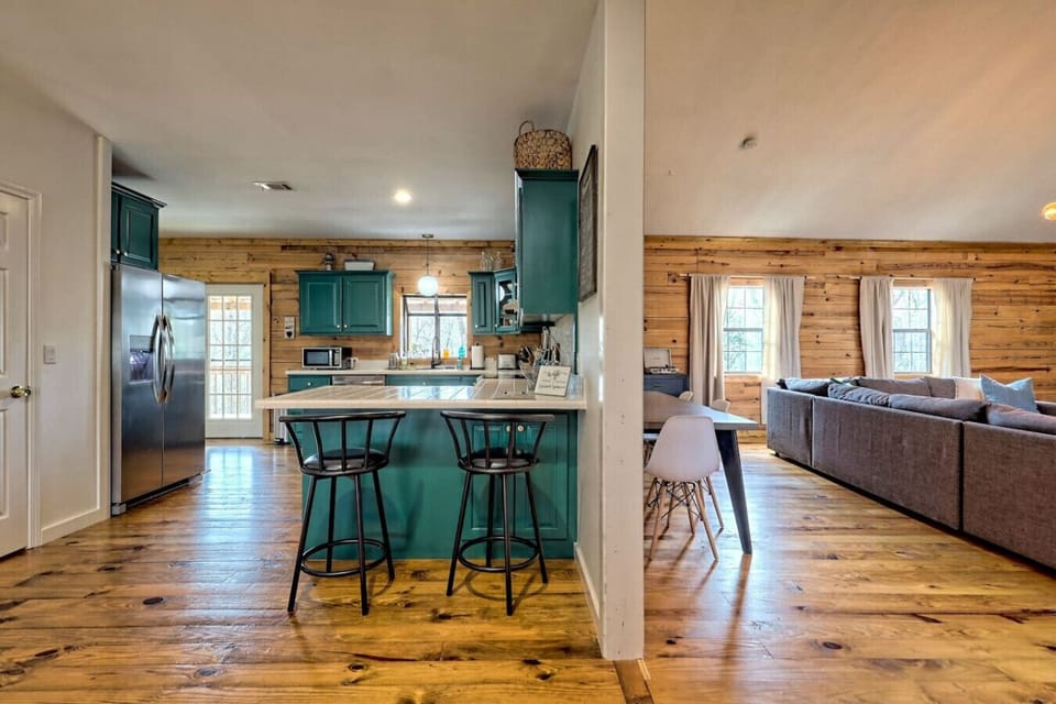 Our main floor is made for groups - open kitchen, dining, & living rooms with space for everyone!