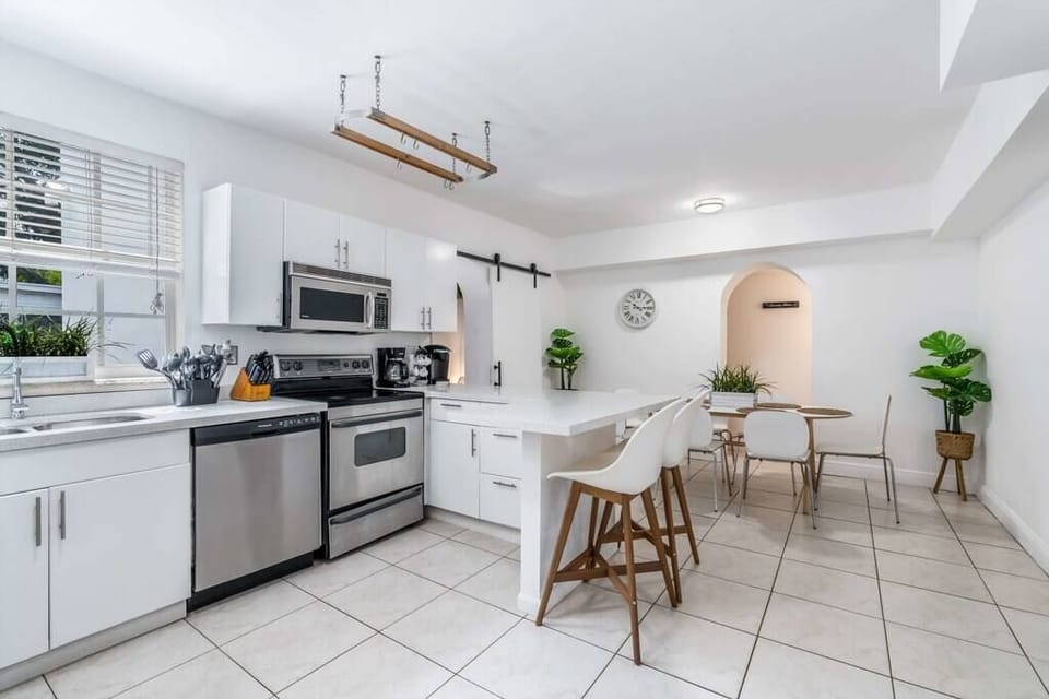 Open Kitchen with an L shape  Counter Top