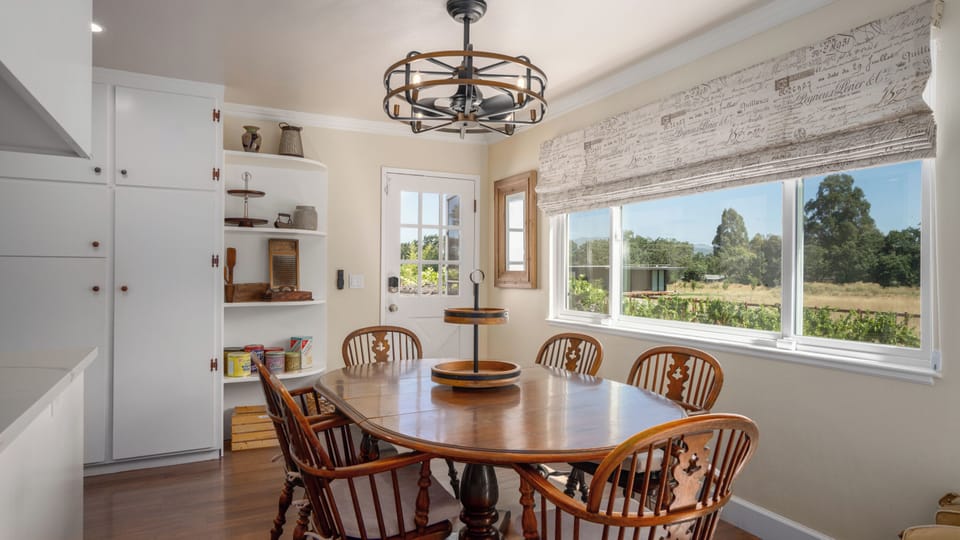 Dining with a view of the Grace Benoist Ranch vineyard .
