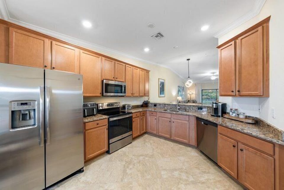 Stainless GE Appliances are provided in the kitchen