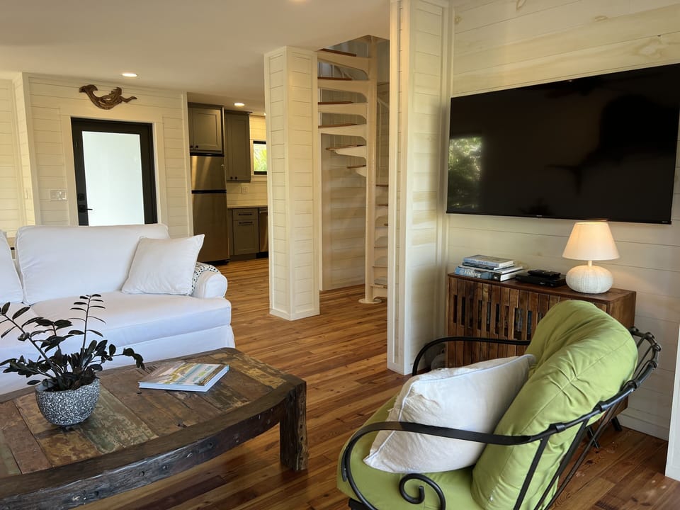 The first floor is an open plan & kitchen, dining, family rooms flow together.