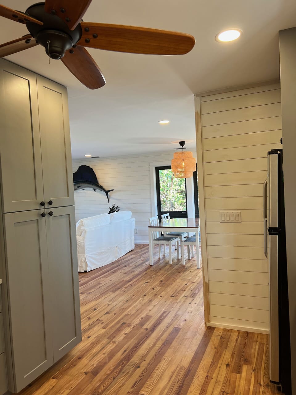 View from the kitchen into the dining and living area.