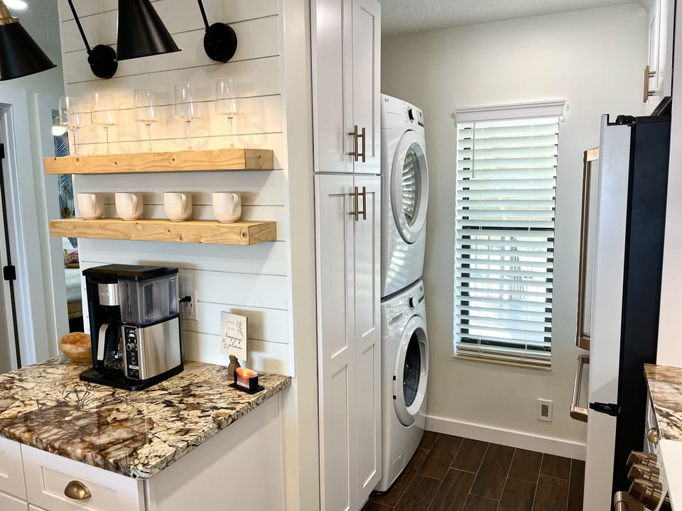 Coffee bar, tower cabinet, and stackable full-size washer & dryer