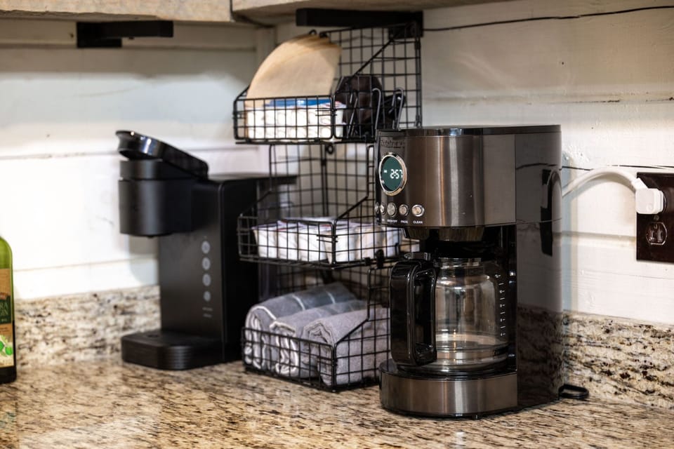 Coffee station with filters, creamer, sugar, Splenda & K cups.