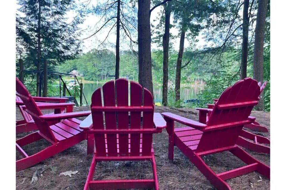 Adirondack chairs with a river view