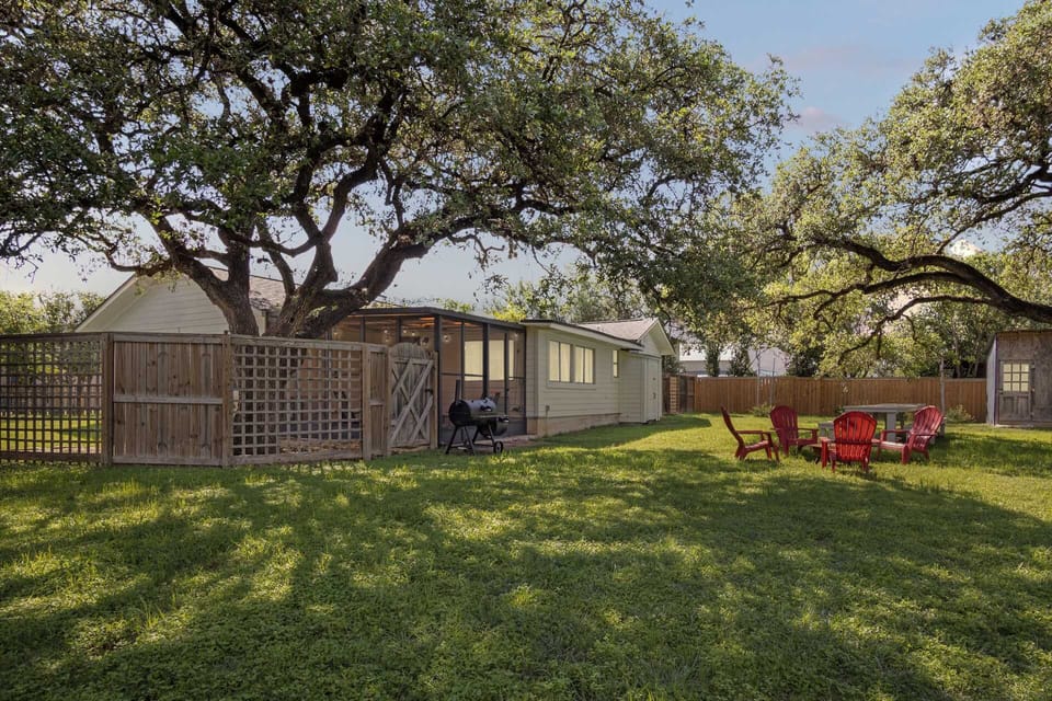 There's a great big double picnic table for family feasts, and the back yard is fenced in for pet and child safety