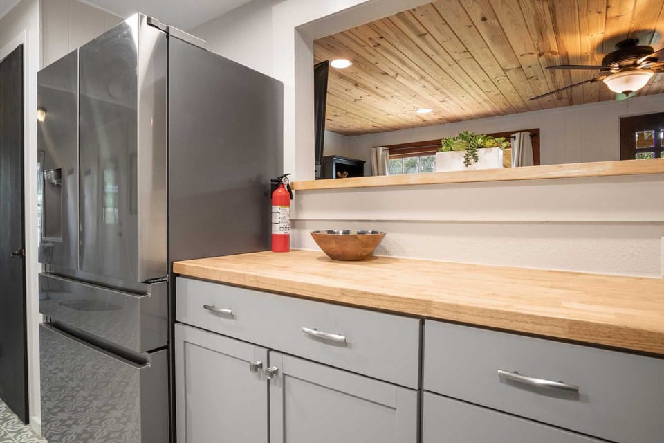 You'll also find plenty of counter space, cooking ware, and table service for eight!