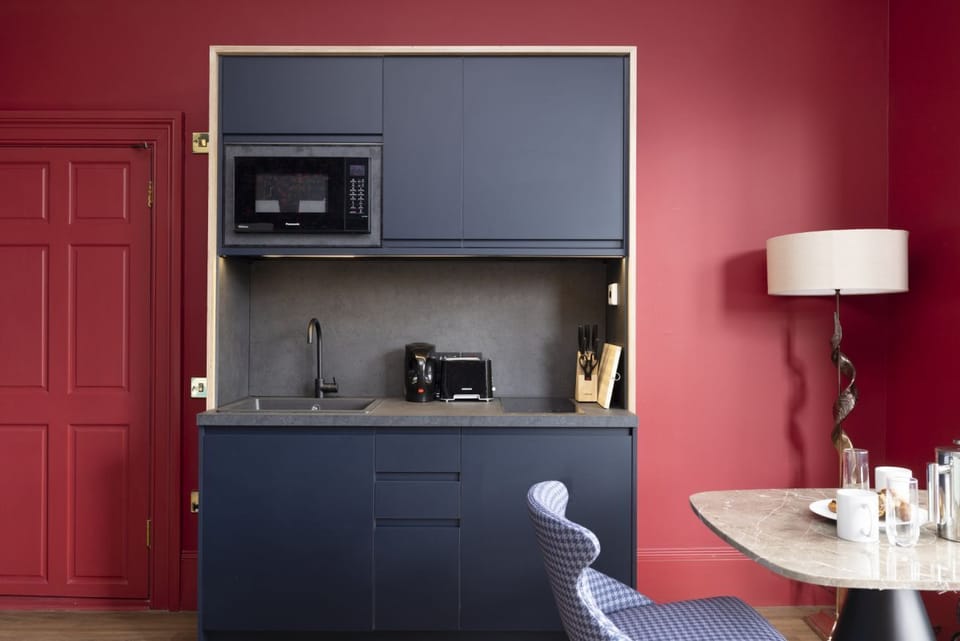 Studio with bed and kitchen