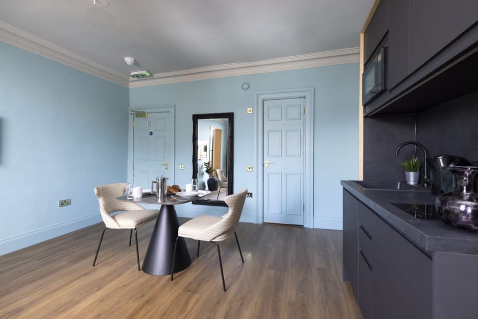 Studio with bed and kitchen