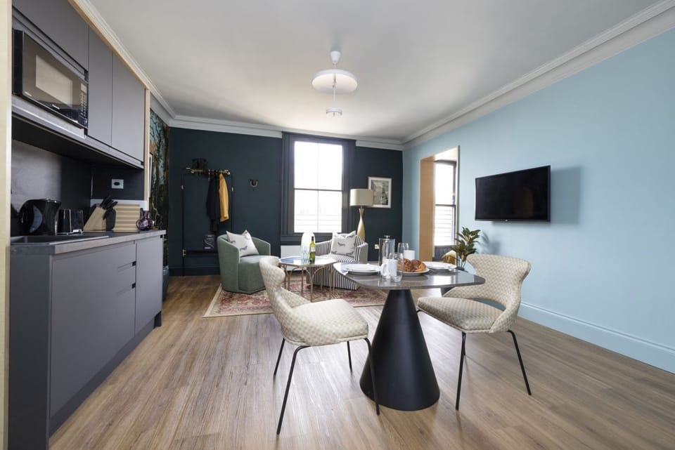 Studio with bed and kitchen