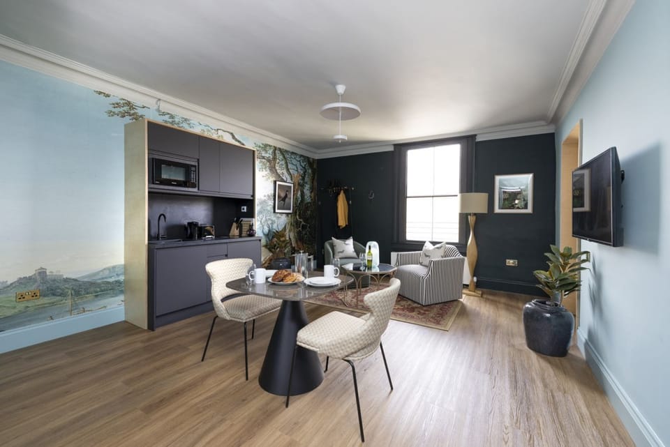 Studio with bed and kitchen