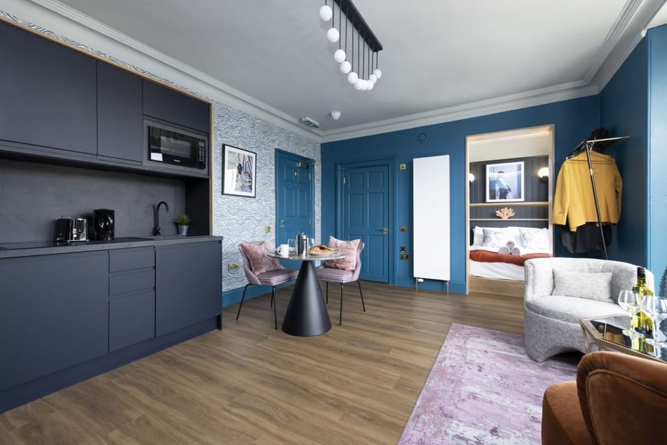 Studio with bed and kitchen