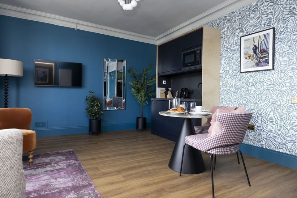 Studio with bed and kitchen