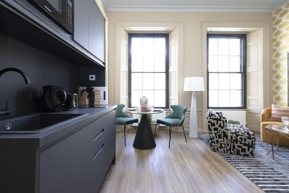 Studio with bed and kitchen