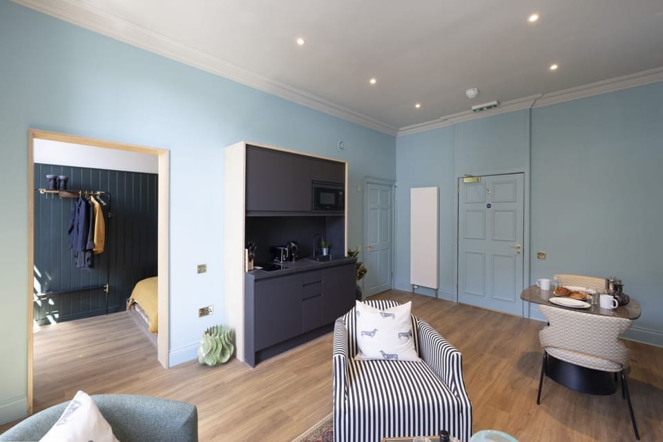 Studio with bed and kitchen