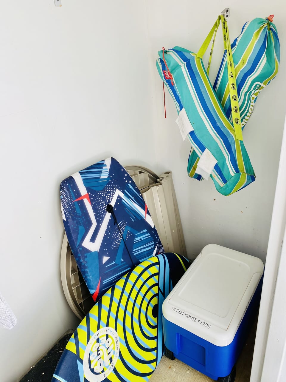 Toys, 2 low-lying beach chairs, beach umbrella, cooler, boogie boards + more!