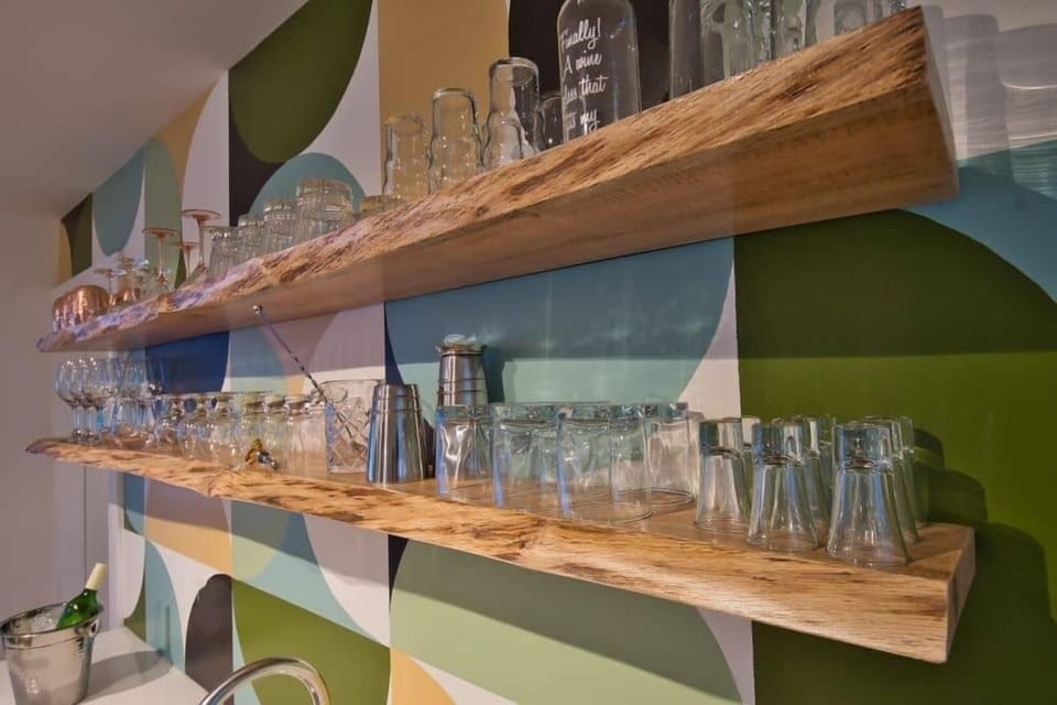 Our wetbar!  Complete with all the glassware you will need to make your signature cocktail or ours!   