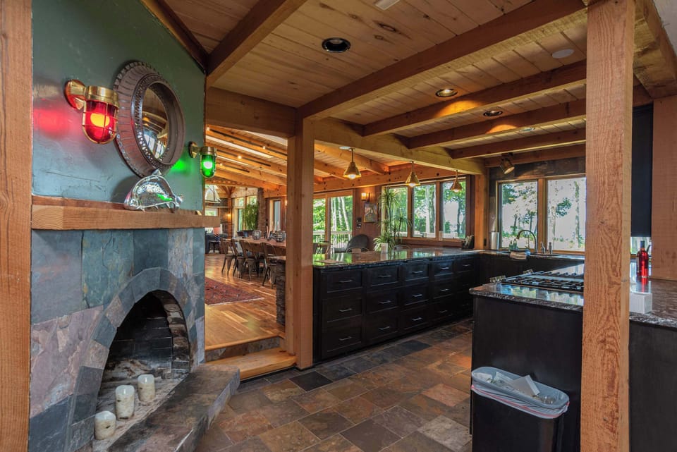 Wood burning fireplace off the kitchen