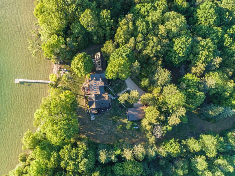 Aerial view of home and property