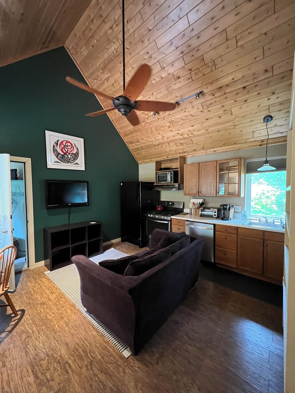living space in loft apt. side of house - TV with small couch; WiFi but no cable