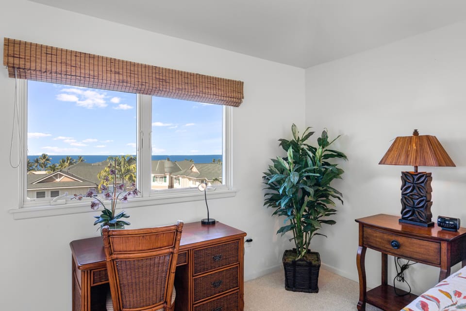 The master bedroom comes with a little work desk.