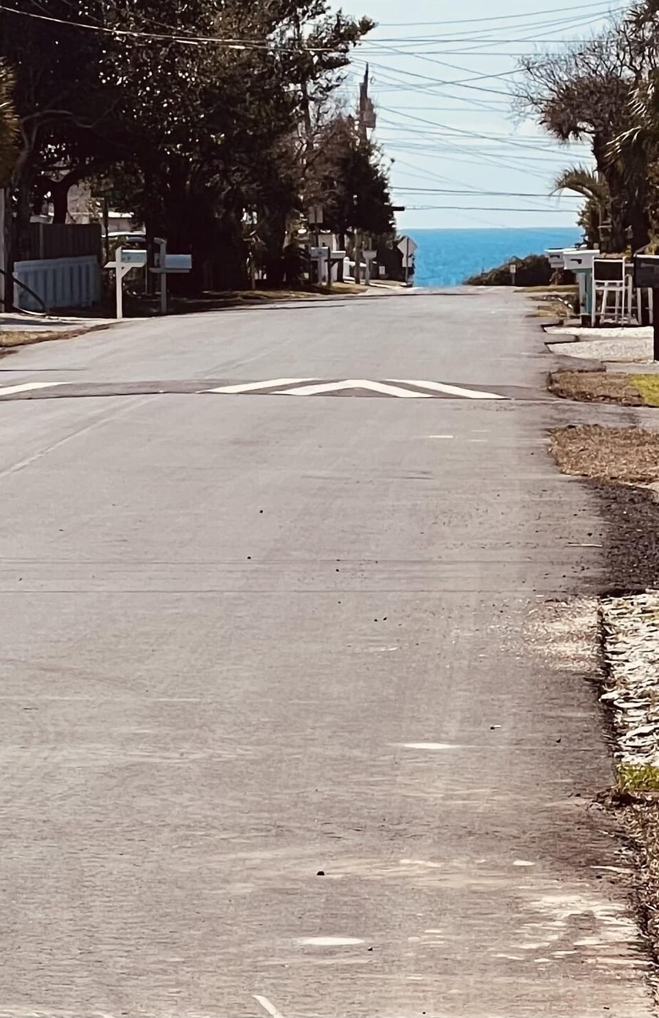Driveway view of your direct beach access. 