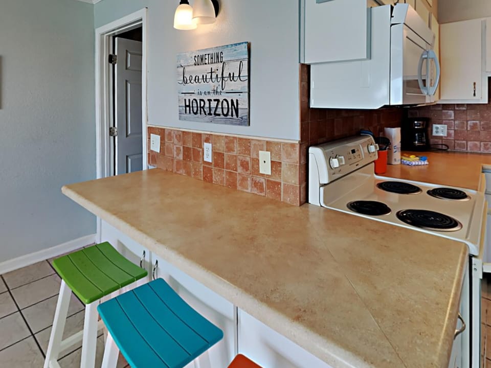 Bar Seating and Kitchen