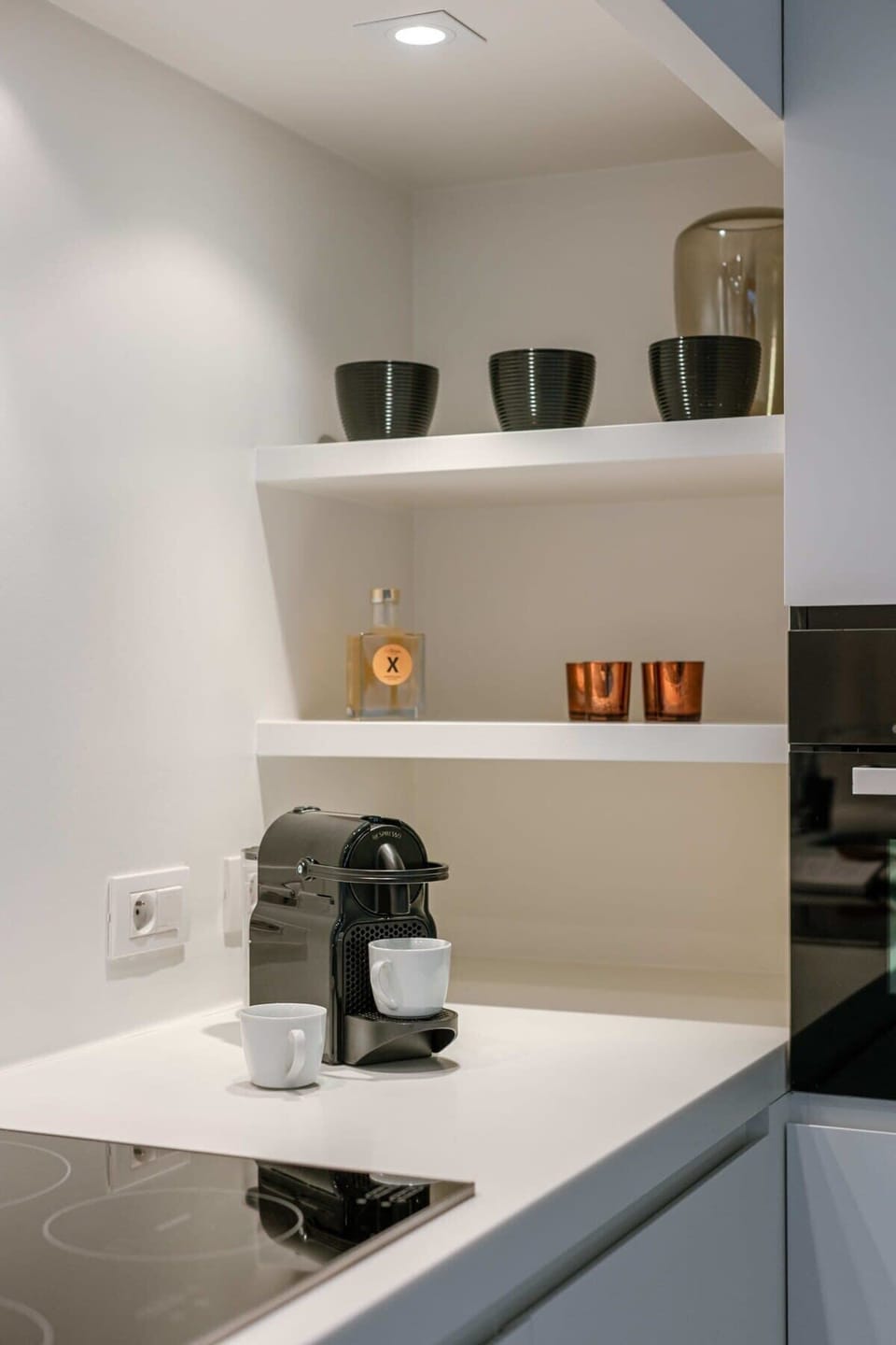 Compact kitchenette with natural finishes and coffee :)