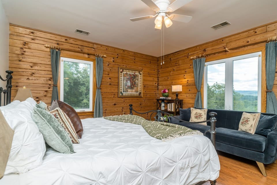 Main floor Master Bedroom with Kind bed and mountain views