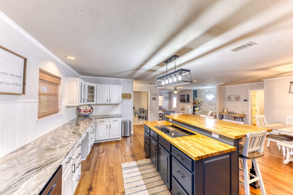 Full kitchen that opens to the dining room and living room