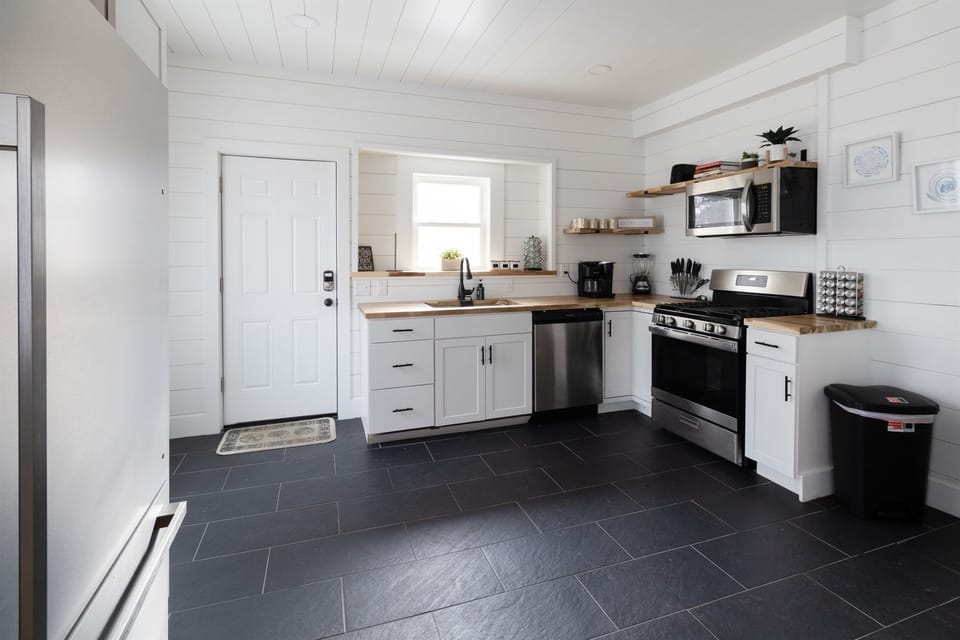 The stylish kitchen combines beautiful design with efficiency.