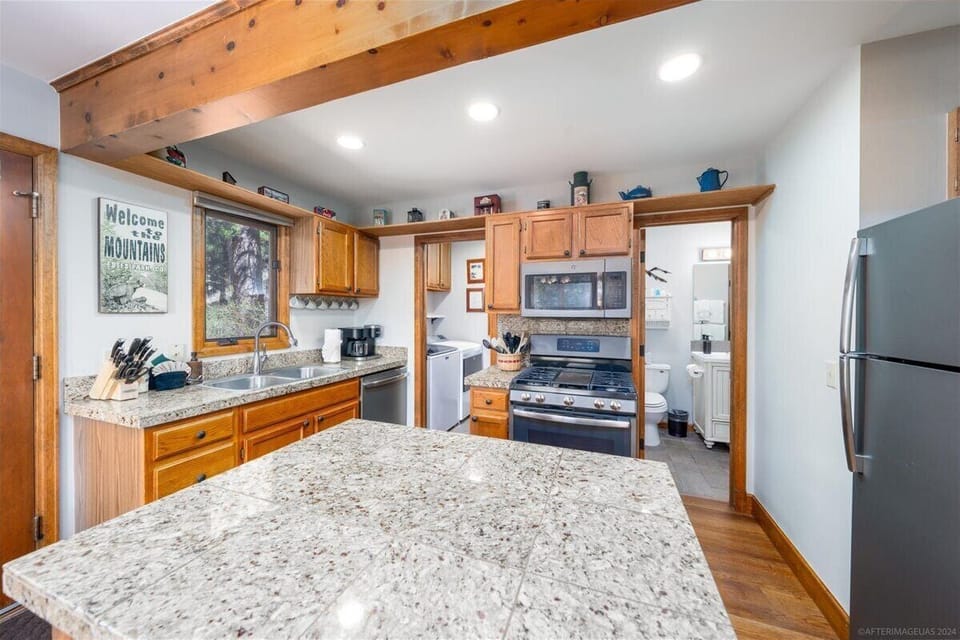 The kitchen has everything you need to cook a family meal after a long hike.