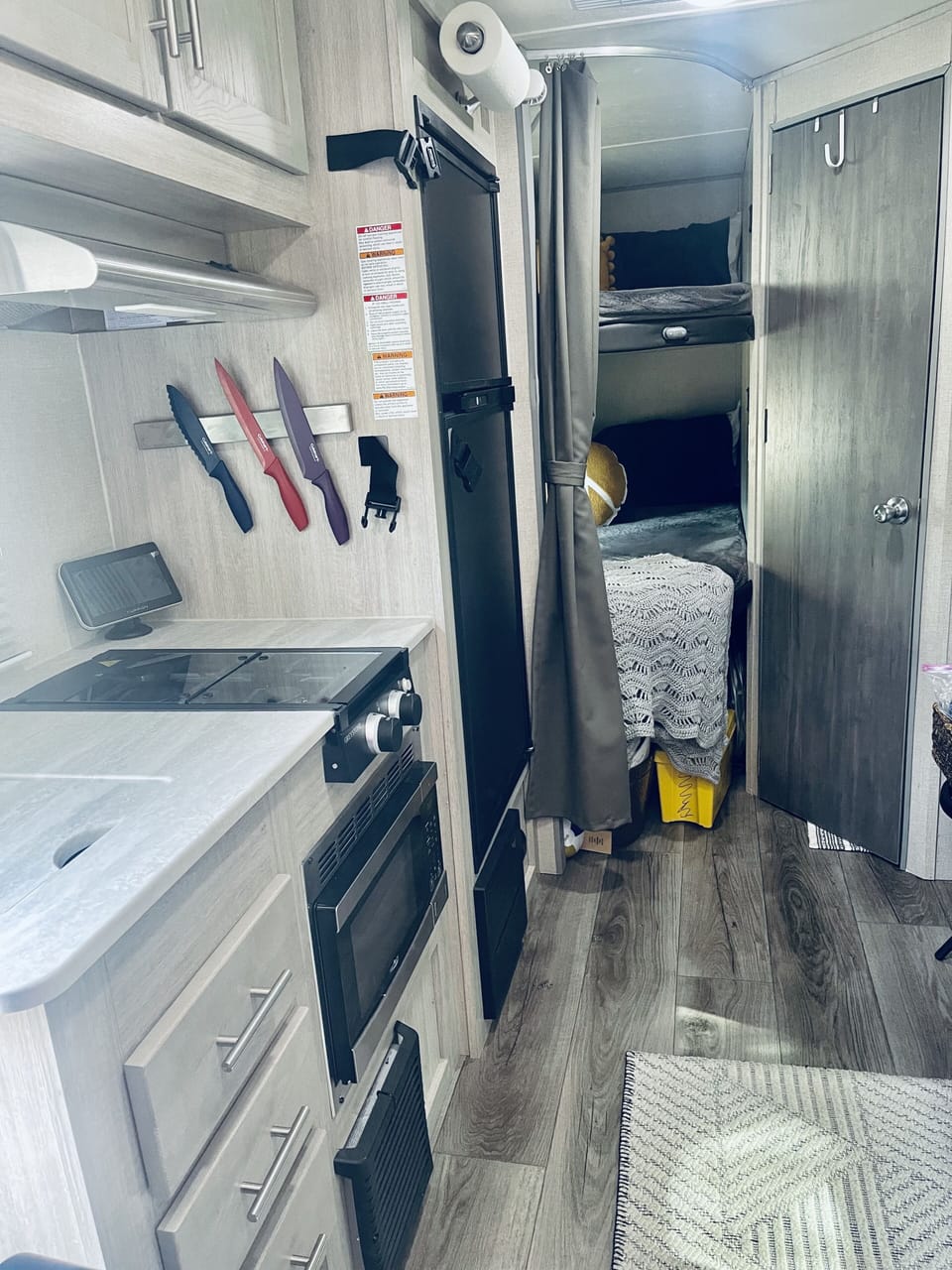 Fully stocked kitchen- large fridge/ freeze/stove top/ microwave/flat grille.