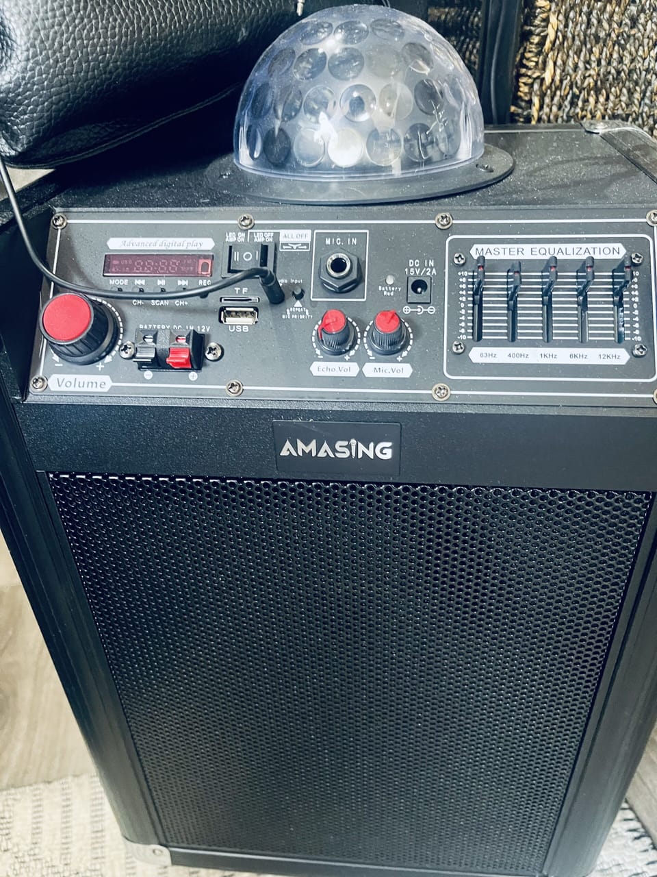 Karaoke machine, hooks up to any phone! Mic included.