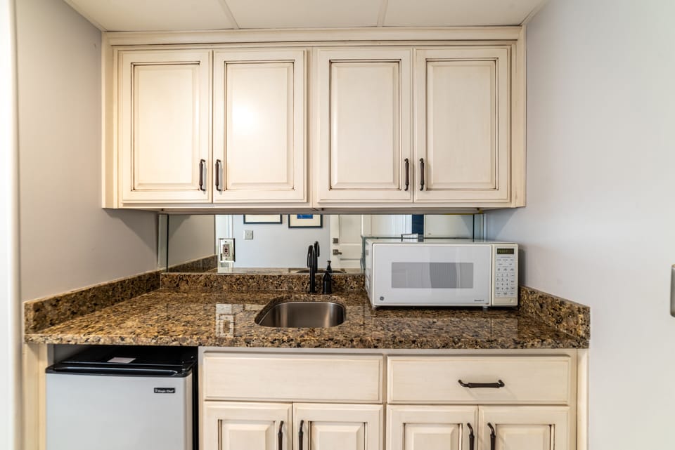 Your mother in law suite has a mini-kitchen and a separate entry.