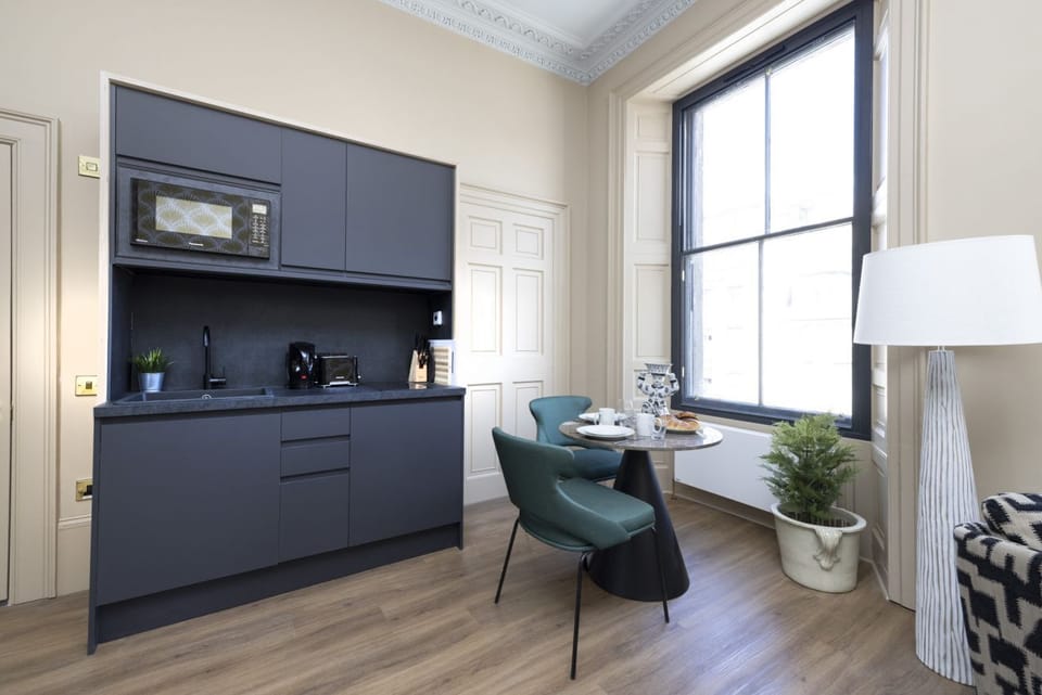 Studio with bed and kitchen